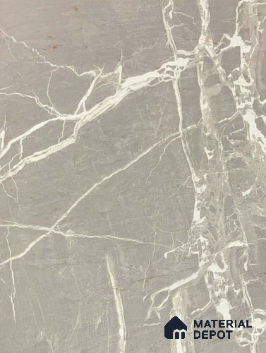 A close-up of a Grey IM 1115 Sagrada Marble with a Texture finish Decorative Laminate available at Material Depot in Bangalore