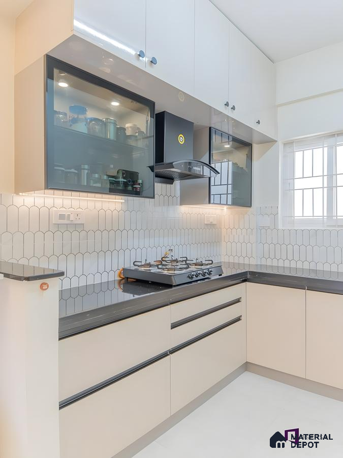 Compact L-Shaped Kitchen With Glossy Laminate Finish And Scallop Tile Backsplash | Material Depot
