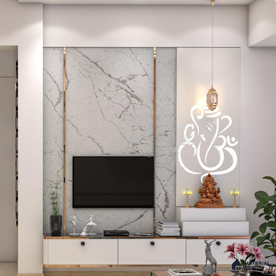 Eco-friendly TV unit with Ganesh wall art, brass accents, and stylish lighting