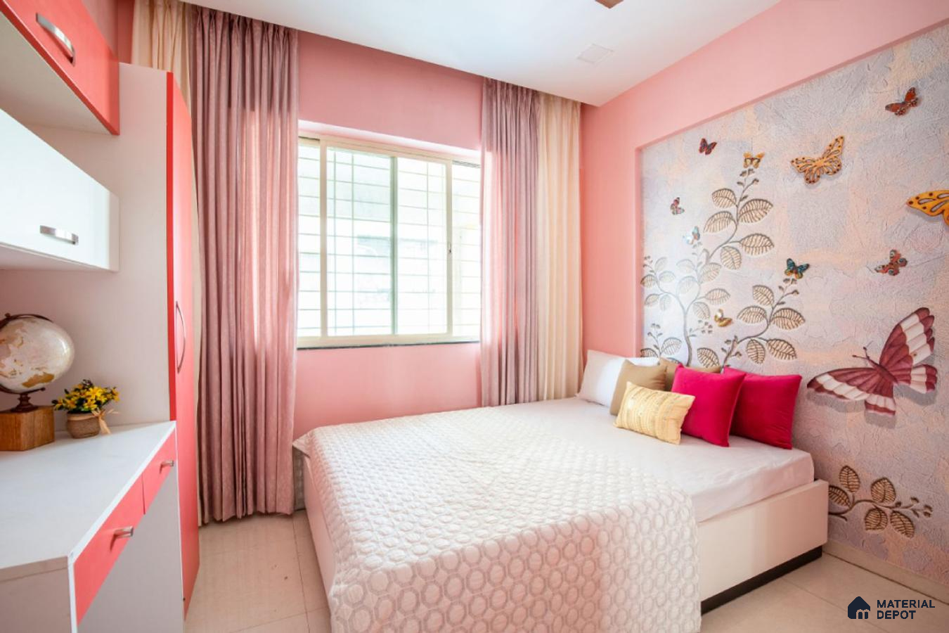 A beautiful and modern girls' room with pink interiors, butterfly art, and a cute study table, creating a whimsical and inspiring space