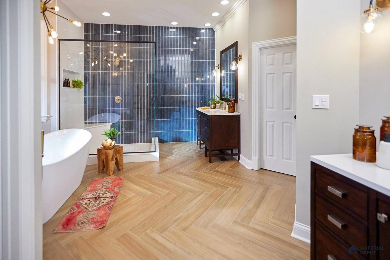 Bathroom with blue tiles and wooden flooring