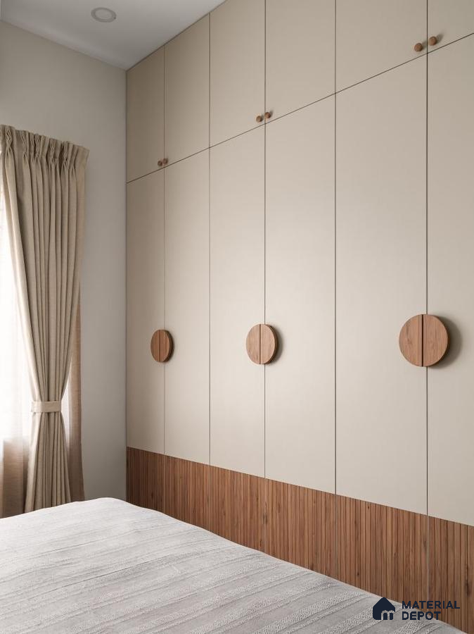 Minimalist bedroom with beige solid color laminate wardrobe and vertical wood grain laminate accents | Material Depot