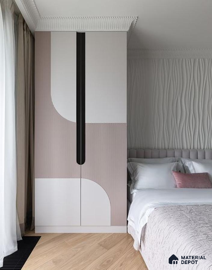 Minimalist bedroom with blush pink fluted laminate wardrobe, 3D wave wall panel, and light oak wooden flooring | Material Depot