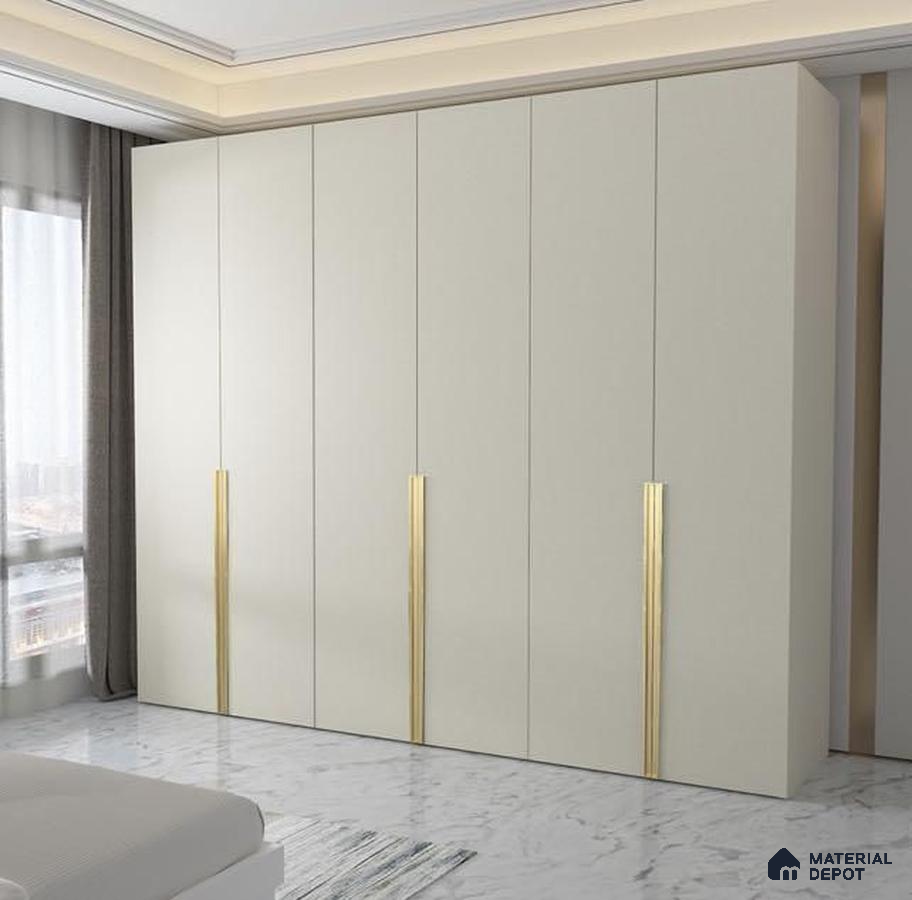 Minimalist bedroom with frosty white laminate wardrobe and gold accent handles on marble floor | Material Depot