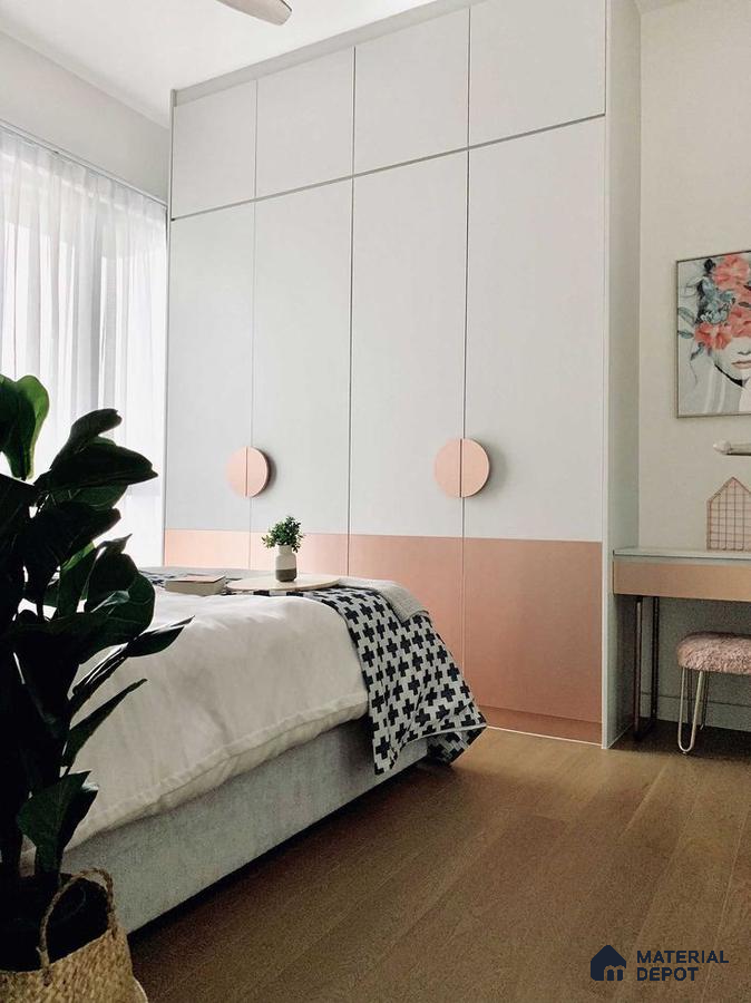 Minimalist bedroom with pastel pink and white laminate wardrobe and light oak wooden flooring | Material Depot