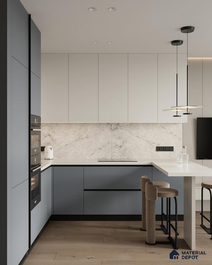 Minimalist kitchen with matte blue and white laminate, marble-look backsplash, and light oak wooden flooring in Bengaluru | Material Depot