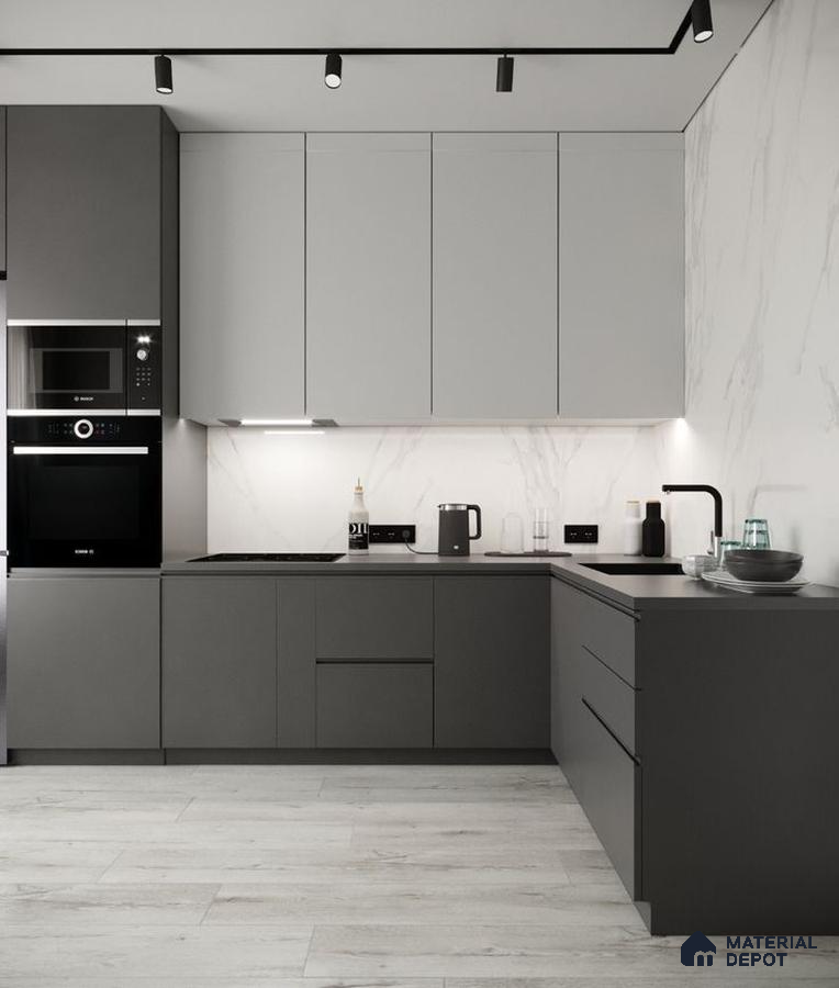 Minimalist kitchen with matte grey and white laminate, marble-look backsplash, and light wood floor tile in Bengaluru | Material Depot