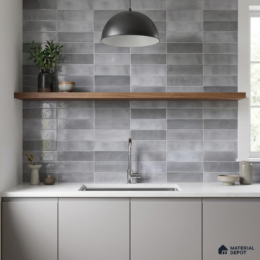 Minimalist kitchen with matte grey subway wall tiles and white quartz countertop