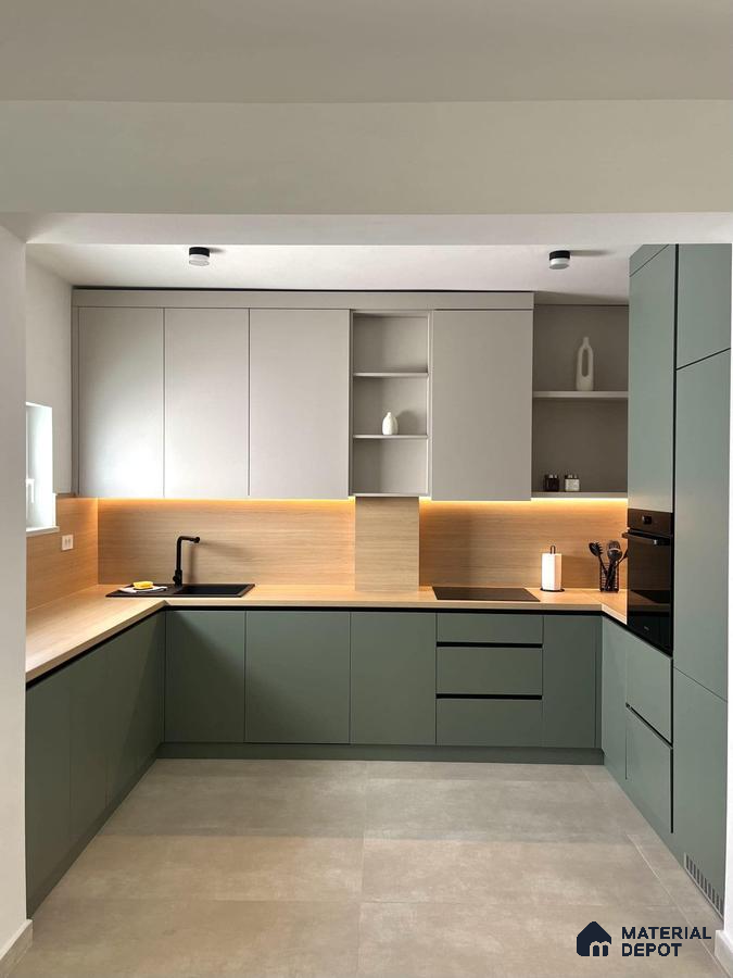 Minimalist kitchen with sage green and frosty white laminate, light wood backsplash, and beige floor tile in Bengaluru | Material Depot