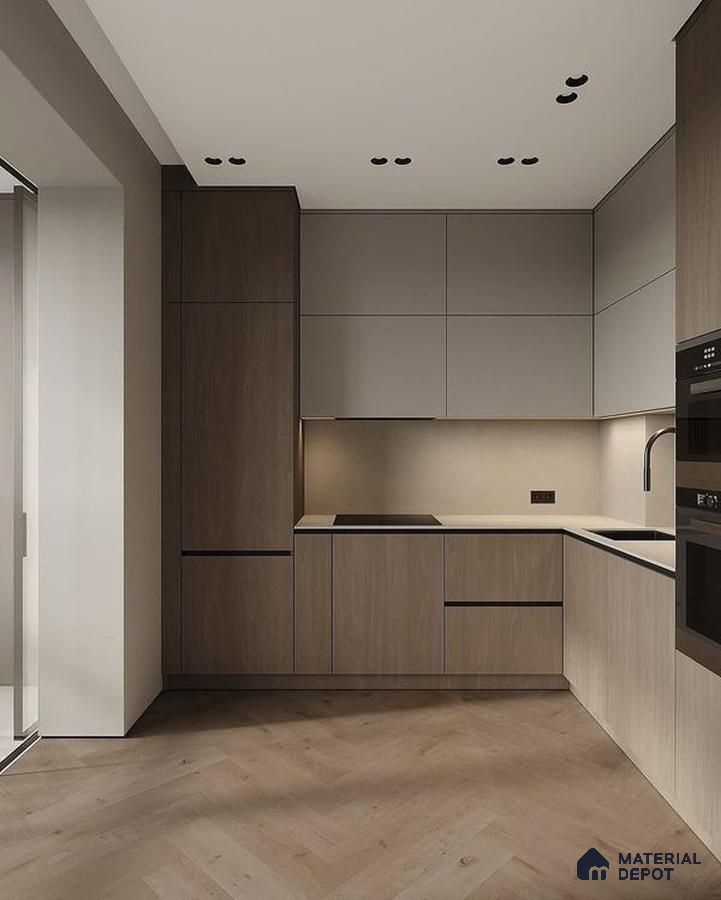 Minimalist kitchen with taupe wood laminate cabinets, matte beige laminate, and herringbone wood flooring in Bengaluru | Material Depot