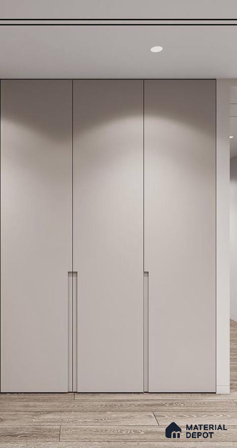 Minimalist wardrobe with frosty white laminate shutters and light oak wooden flooring | Material Depot