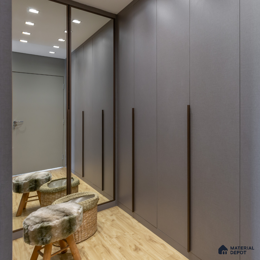 Minimalist wardrobe with matte grey laminate shutters and light oak wooden flooring | Material Depot