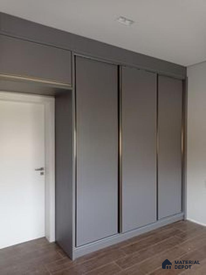 Minimalist wardrobe with matte grey laminate shutters and wood-look floor tile | Material Depot