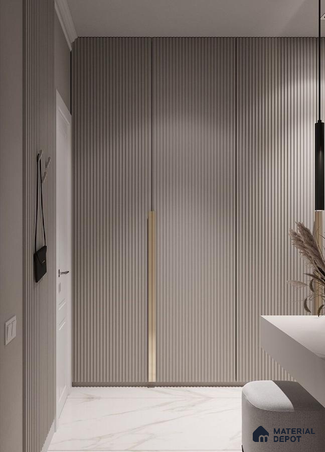 Minimalist Wardrobe with taupe fluted wall panels and white marble look floor tiles | Material Depot