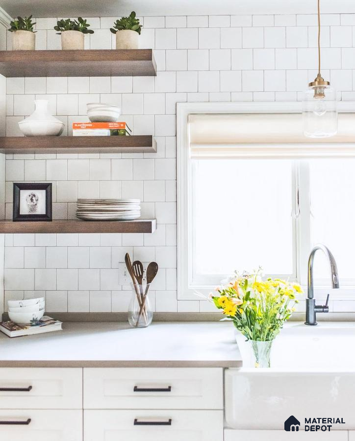 Kitchen unit with white stone tiles