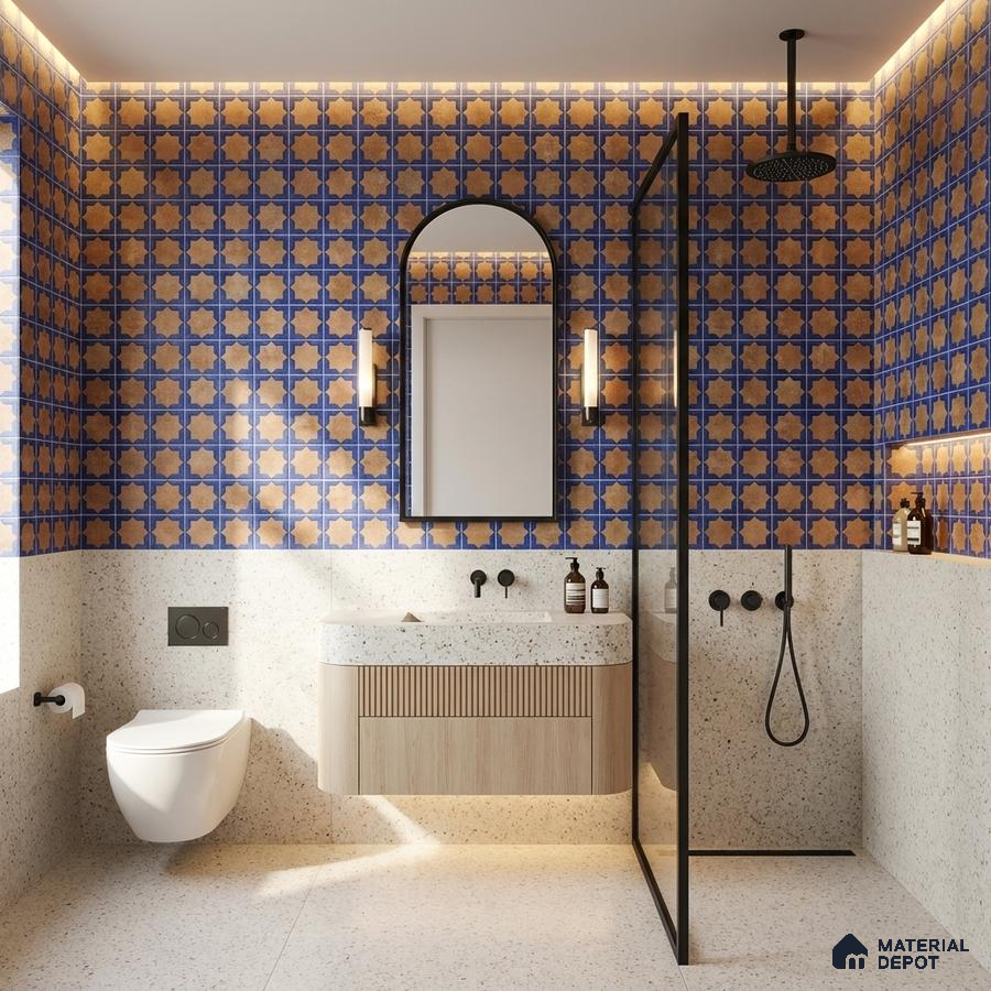 Modern bathroom with blue and terracotta patterned wall tiles and terrazzo floor