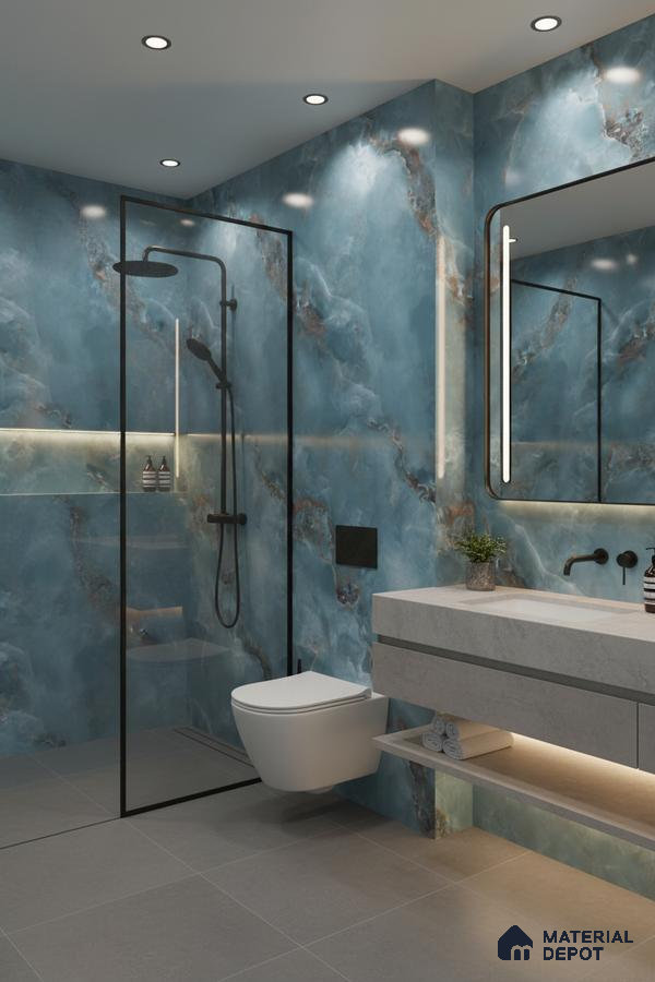 Modern bathroom with blue marble-look wall tiles and grey matte floor tiles | Material Depot