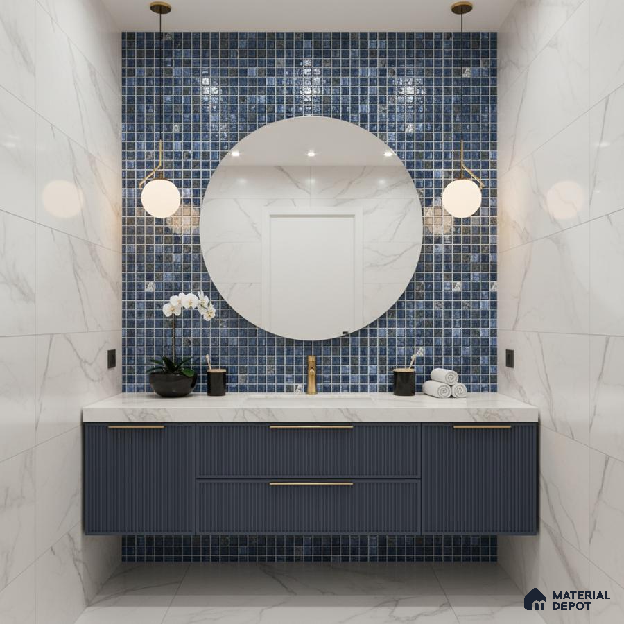 Modern bathroom with blue mosaic wall tiles, marble-look wall tiles, and fluted navy vanity