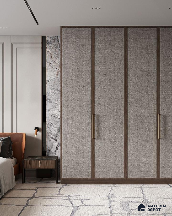 Modern bedroom with fabric textured wardrobe panels, walnut brown trims, and marble accent wall | Material Depot