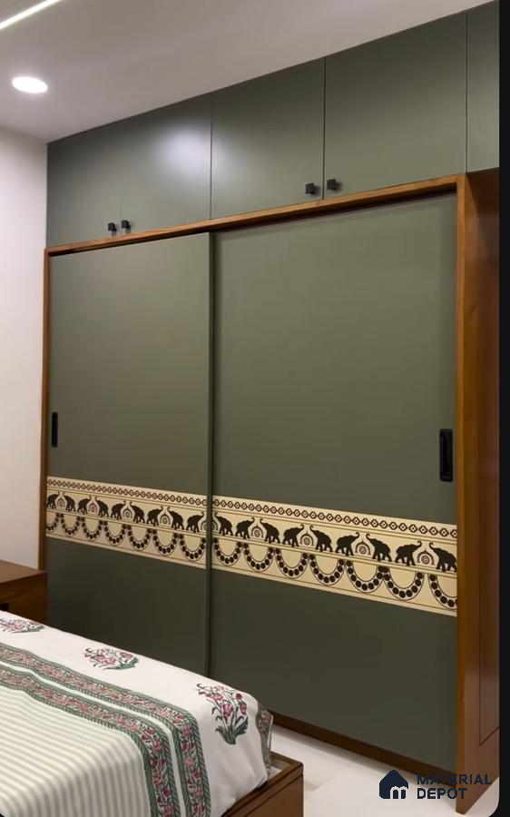 Modern bedroom with olive green solid color laminate wardrobe and Indian motif accent panel | Material Depot