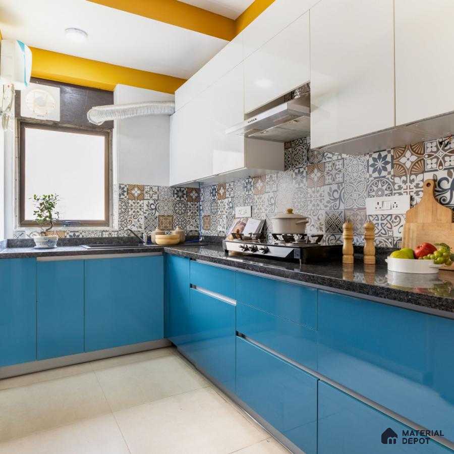 Modern dual tone kitchen with blue high gloss laminate, white laminate, and patterned moroccan backsplash tiles in Bengaluru | Material Depot