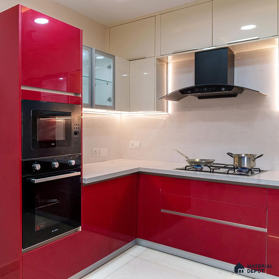 Modern dual tone kitchen with high gloss red and beige laminate, white quartz countertop, and built-in appliances in Bengaluru | Material Depot