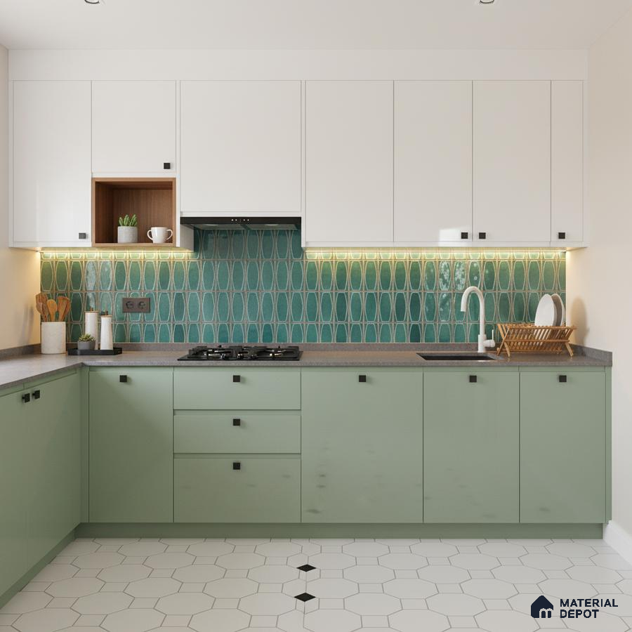 Modern dual tone kitchen with sage green and white laminate, teal geometric backsplash tile, and white hexagonal floor tile in Bengaluru