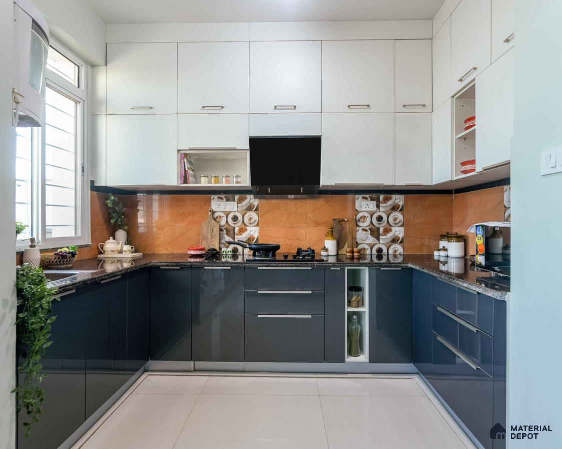 Modern dual tone kitchen with white and charcoal grey high gloss laminate, marble-look backsplash, and granite countertop in Bengaluru | Material Depot