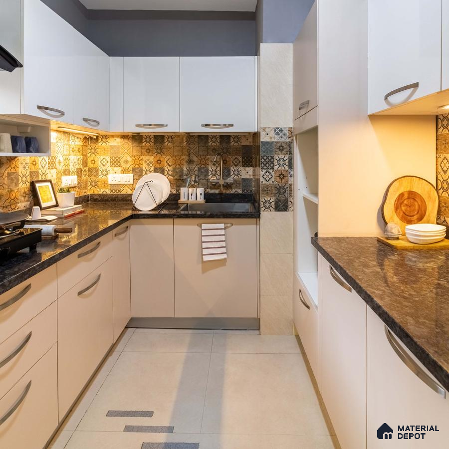 Modern kitchen with beige laminate cabinets, patterned moroccan backsplash tiles, and black granite countertop in Bengaluru | Material Depot