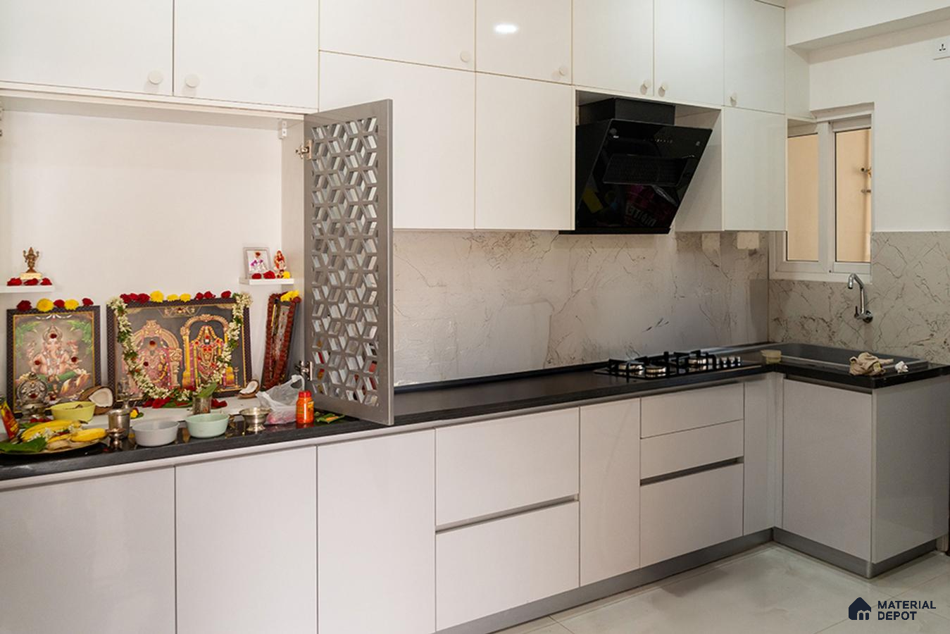 Modern kitchen with frosty white high gloss laminate cabinets and marble-look backsplash in Bengaluru | Material Depot