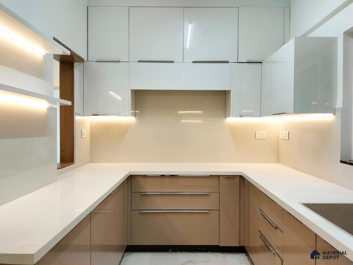 Modern kitchen with glossy white and beige laminate, white quartz countertop, and L-shaped layout in Bengaluru | Material Depot
