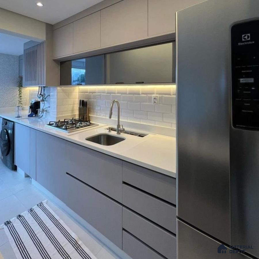 Modern kitchen with grey matte laminate cabinets, white quartz countertop, and white subway backsplash tiles in Bengaluru | Material Depot
