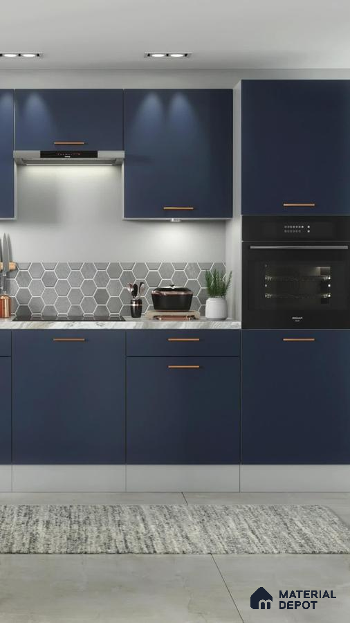Modern kitchen with navy blue laminate cabinets, grey hexagonal backsplash tiles, and marble countertop in Bengaluru | Material Depot