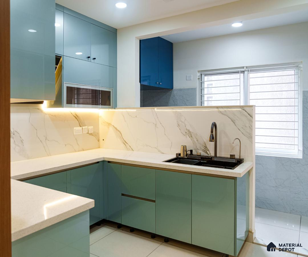 Modern kitchen with pastel blue glossy laminate, white marble-look backsplash tile, and white quartz countertop in Bengaluru | Material Depot