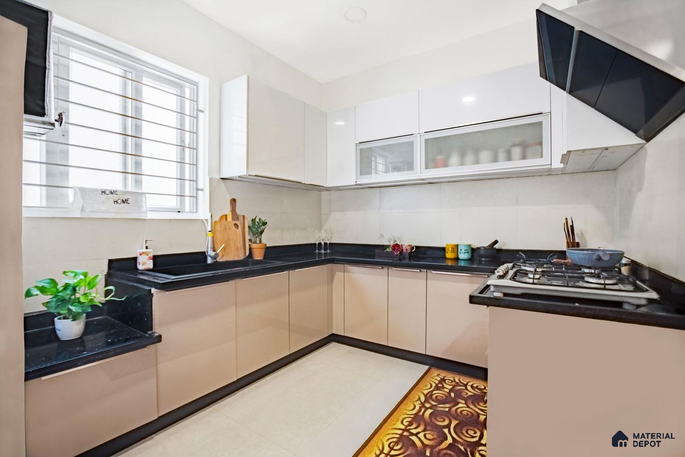 Modern L-shaped kitchen with beige and white high gloss laminate cabinets and black granite countertop in Bengaluru | Material Depot