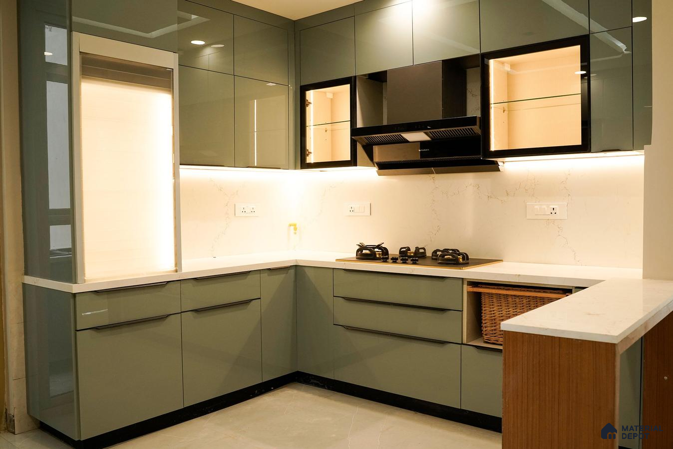 Modern L-shaped kitchen with sage green high gloss laminate, white marble-look quartz countertop, and marble-look backsplash in Bengaluru | Material Depot