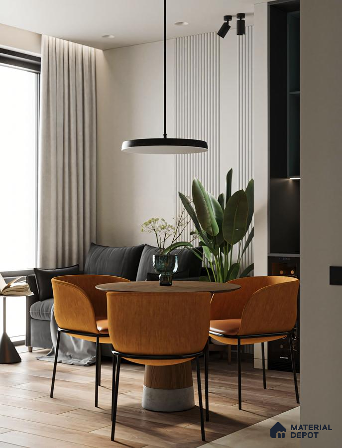 Modern Open-Plan Living Space with Round Dining Table and Orange Chairs | Material Depot