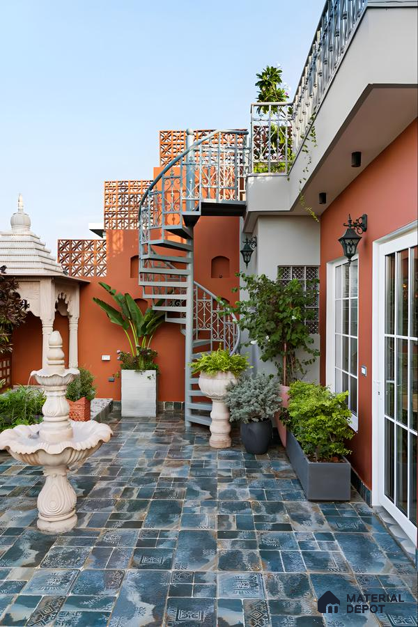 Modern Rooftop Terrace with Spiral Staircase and Colorful Decor | Material Depot