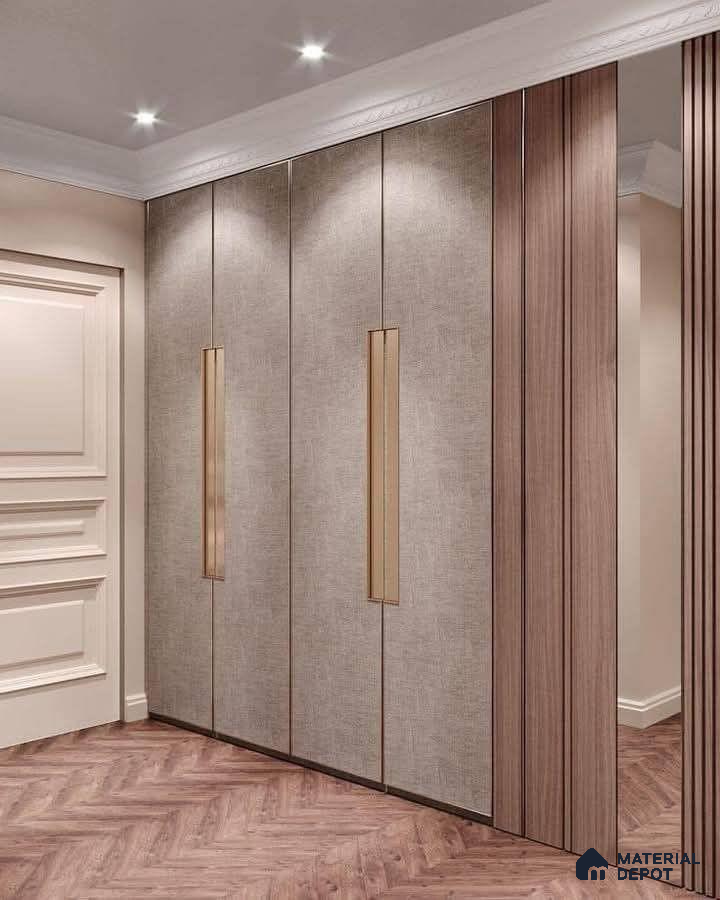 Modern wardrobe with beige fabric laminate, walnut wood fluted panels, and herringbone wooden flooring | Material Depot