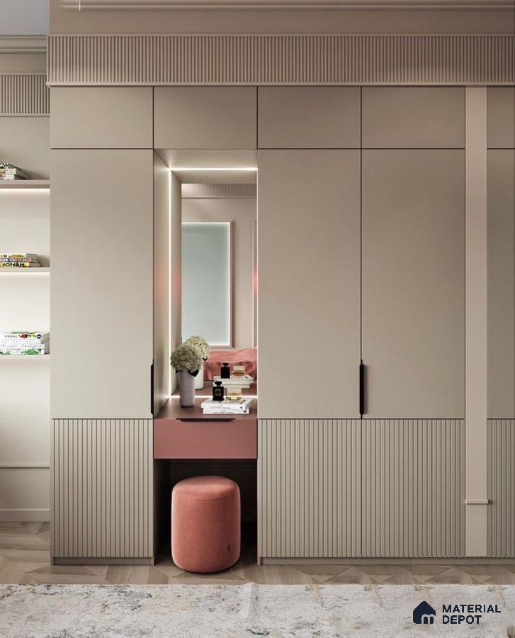 Modern wardrobe with beige fluted laminate, blush pink vanity, and chevron wooden flooring | Material Depot