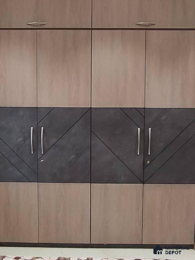 Modern wardrobe with light oak laminate and matte charcoal geometric laminate panels | Material Depot