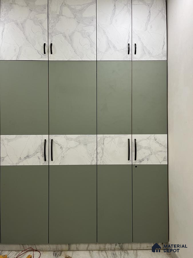 Modern wardrobe with sage green solid laminate and white marble-look laminate shutters | Material Depot