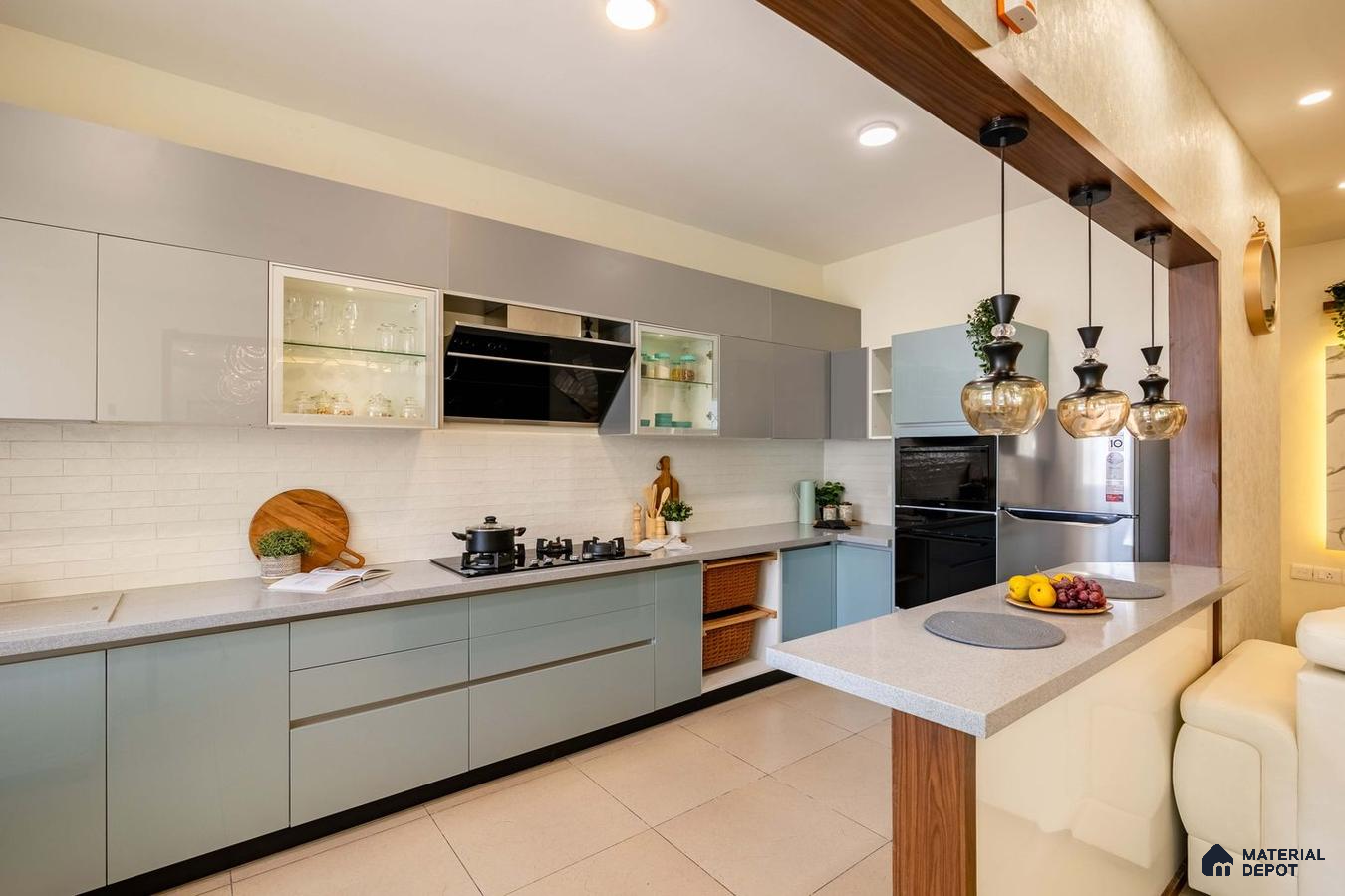 Modern 2 BHK Kitchen in Bangalore with Blue-Themed Decor and Ample Cooking Space
