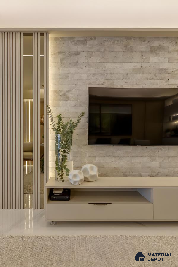 Neutral Stone Tile Tv Wall With Soft Lighting And Minimal Decor Accents | Material Depot