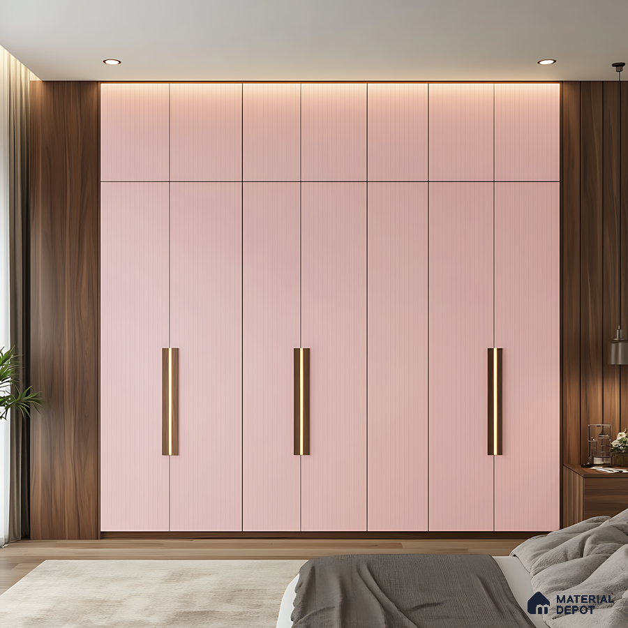 Modern Pink Fluted Wardrobe with Vertical Brass Handles in a Cozy Bedroom | Material Depot