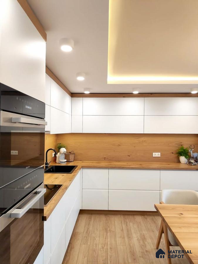 Scandinavian kitchen with white matte laminate cabinets and natural oak wood countertop in Bengaluru | Material Depot
