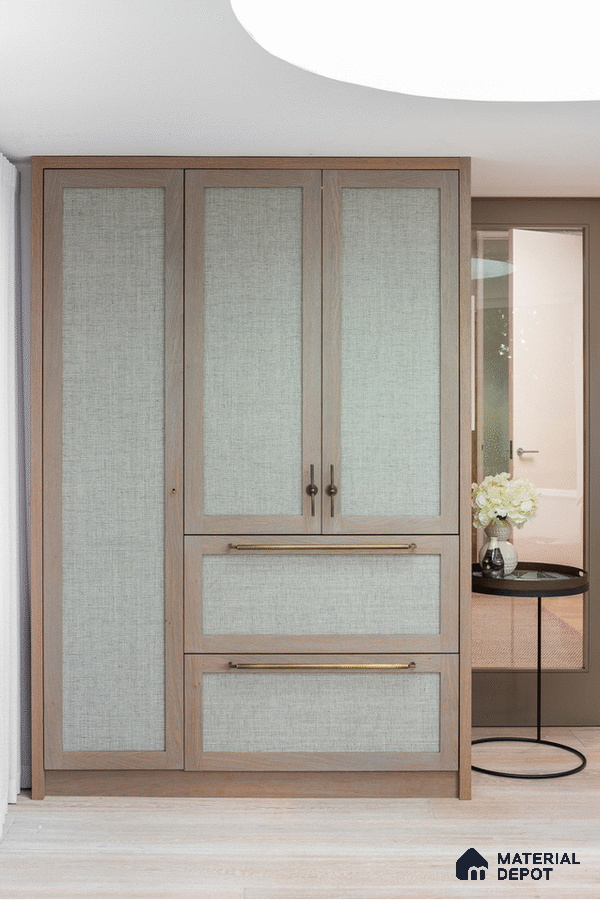 Scandinavian wardrobe with light oak frame and textured fabric laminate panels | Material Depot