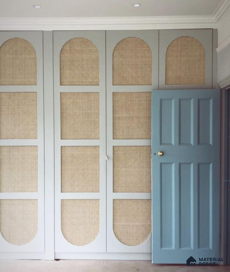 Scandinavian wardrobe with pastel blue frame and natural cane shutters | Material Depot