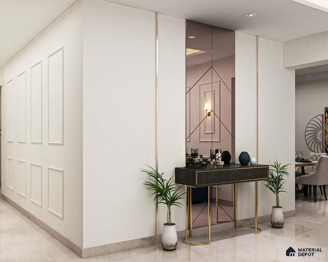 Foyer with white walls and marble tile flooring