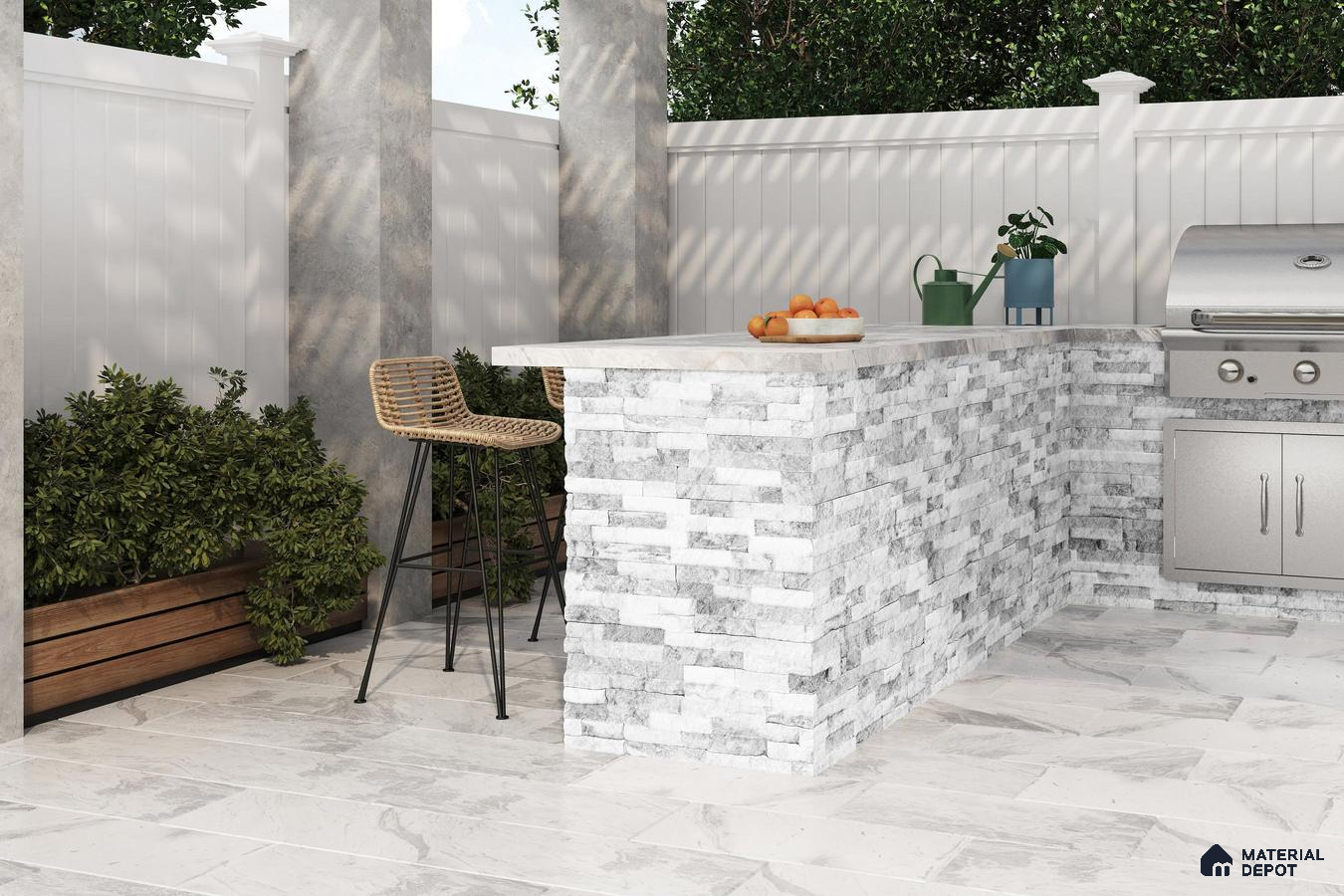 Outdoor space with marble floor tiles and patterned stone tiles